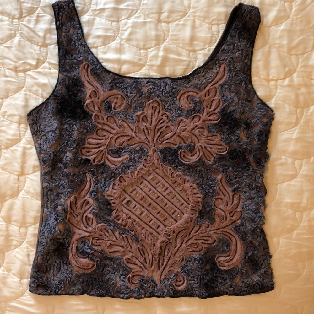 Sleeveless Ornate Top.